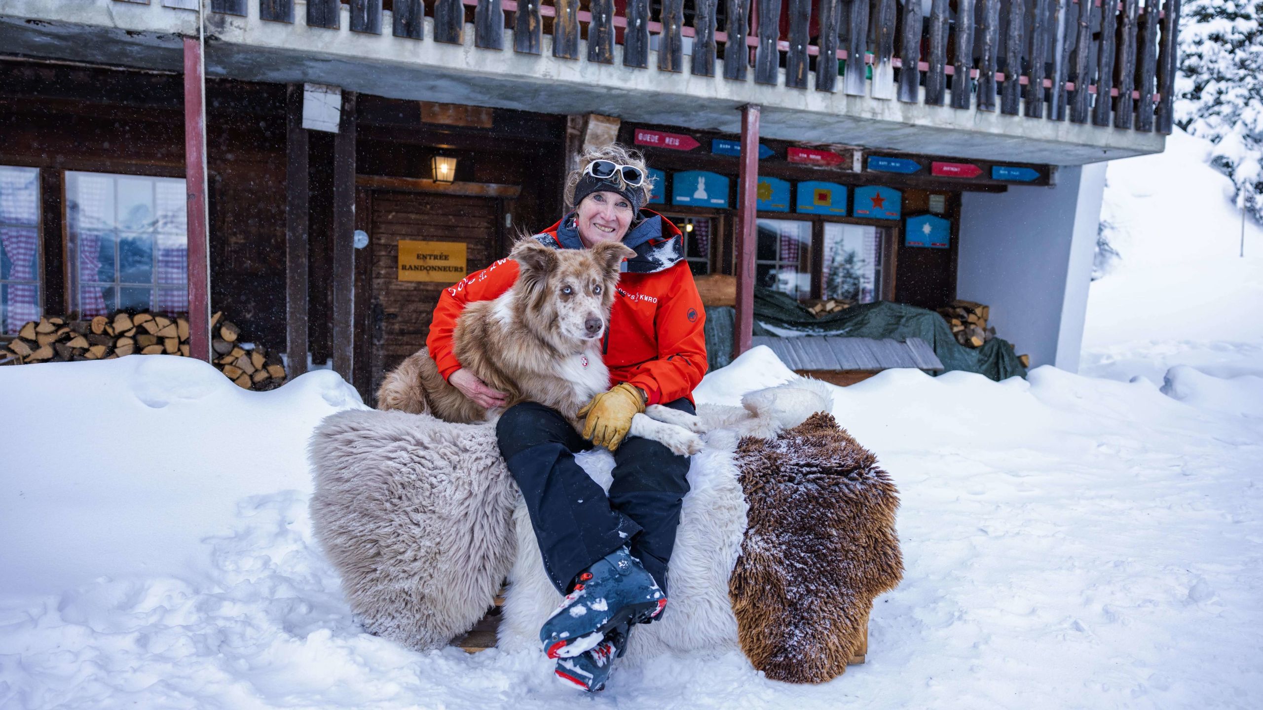 Christine Oguey and her avalanche dog Chulu, winter in valais, Switzerland