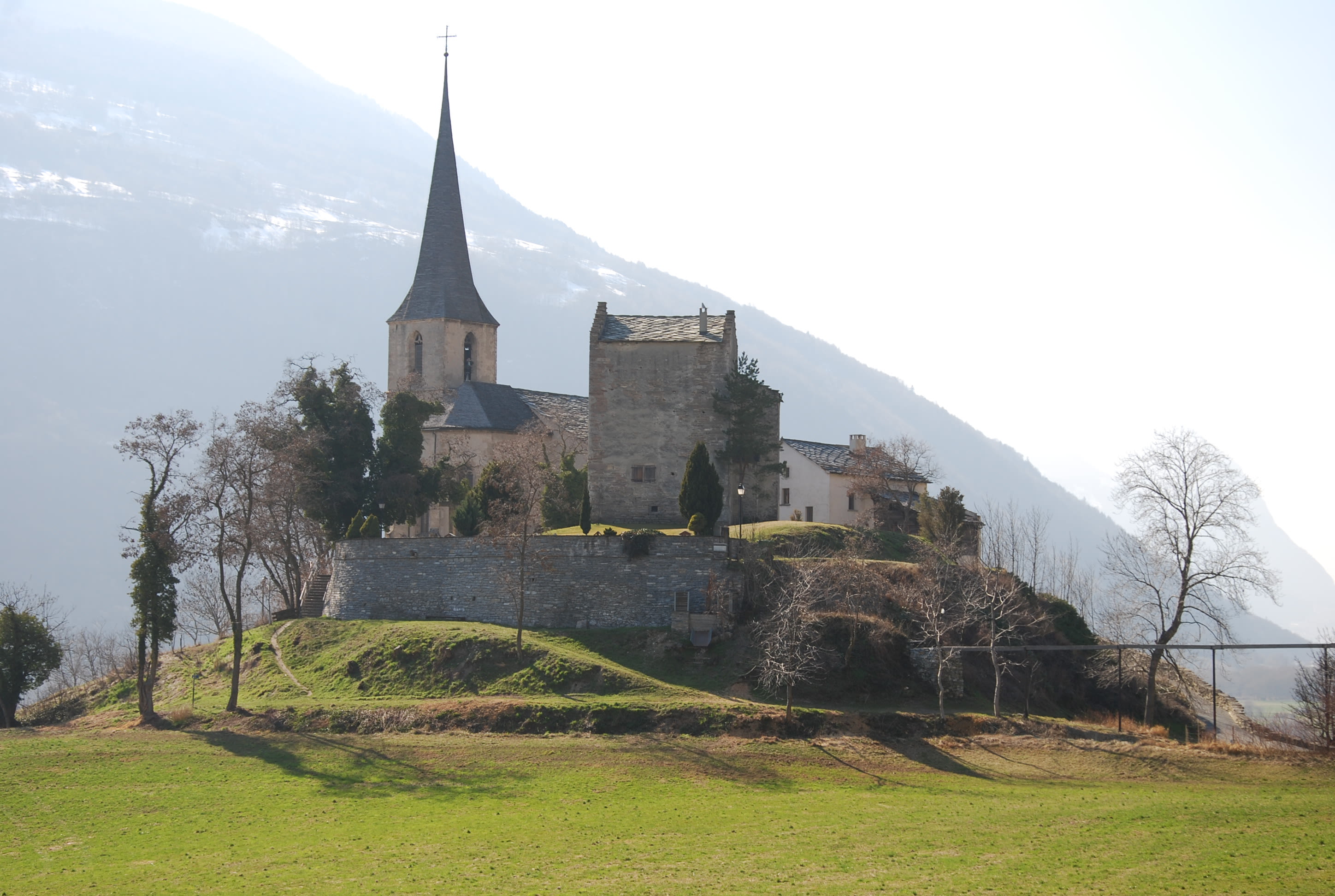 Castle church in Raron - Niedergesteln during summer, Valais