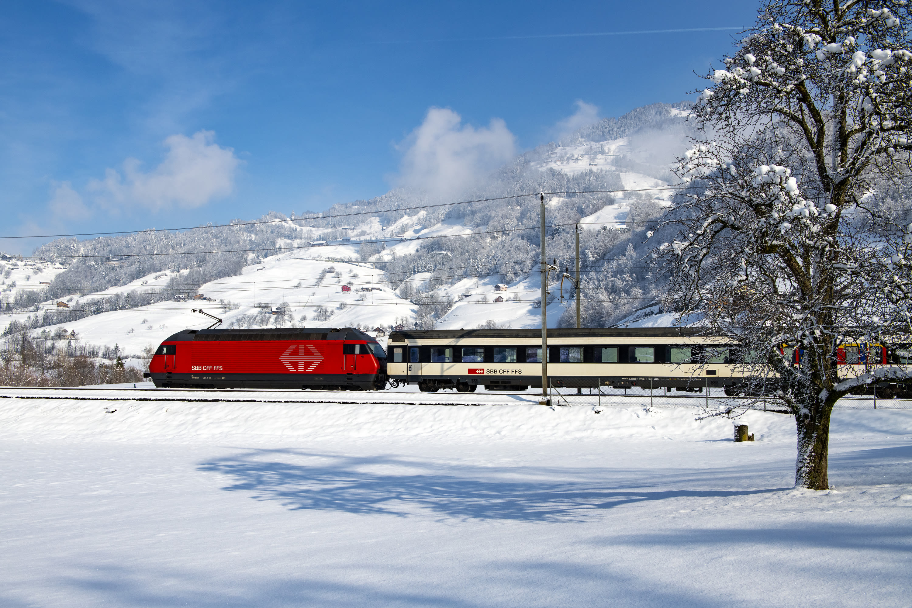 A SBB train in a winter environment.