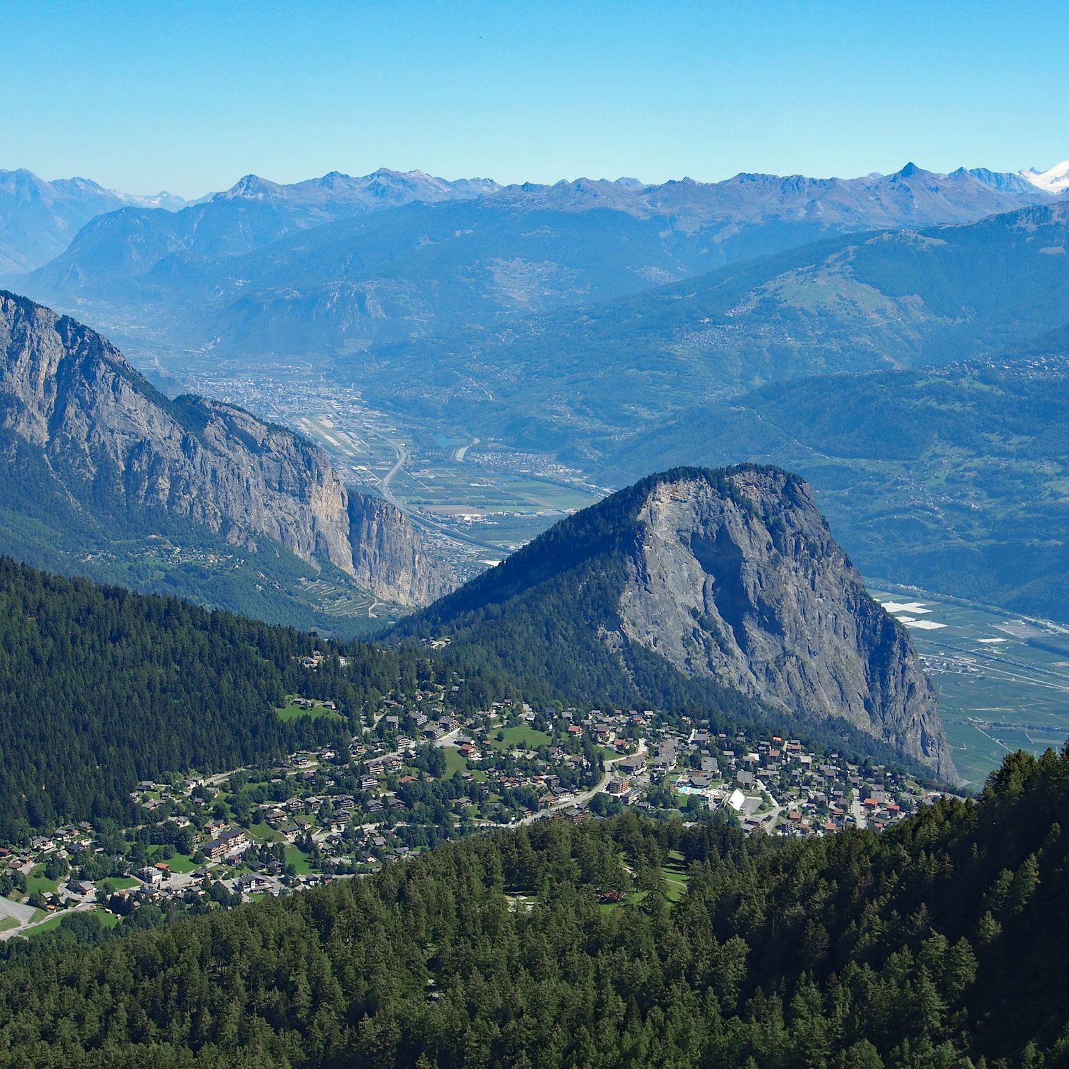 View of Ovronnaz from the Petit Pré in summer with the Ardève in the background. Valais. Switzerland