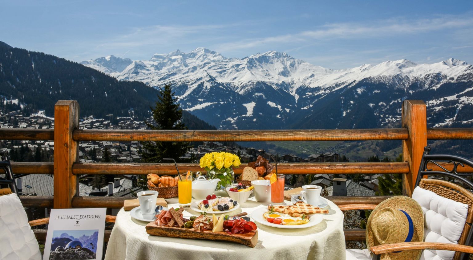 Brunch at the Chalet d'Adrien in Verbier on the terrace with a magnificent view of the mountains. Valais Switzerland