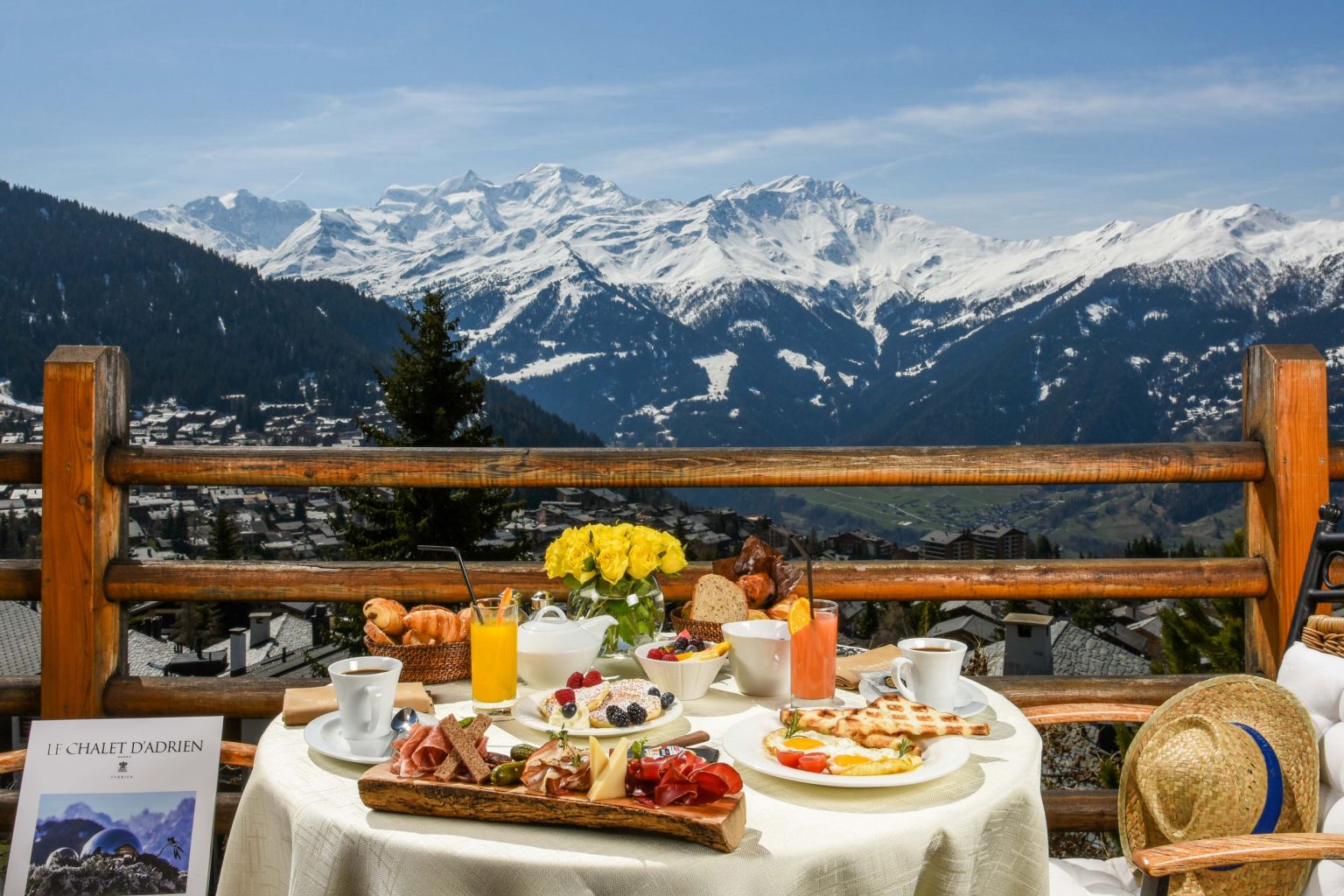 Brunch at the Chalet d'Adrien in Verbier on the terrace with a magnificent view of the mountains. Valais Switzerland