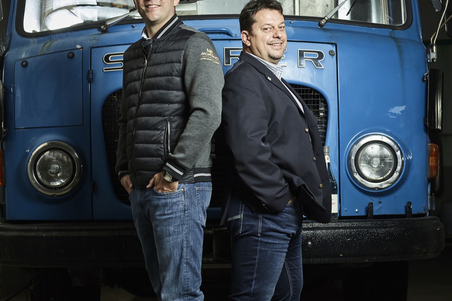 130 years Morand: Julien Morand, great-grandson of the founder, and director Fabrice Haenni (left) in front of a historic truck.