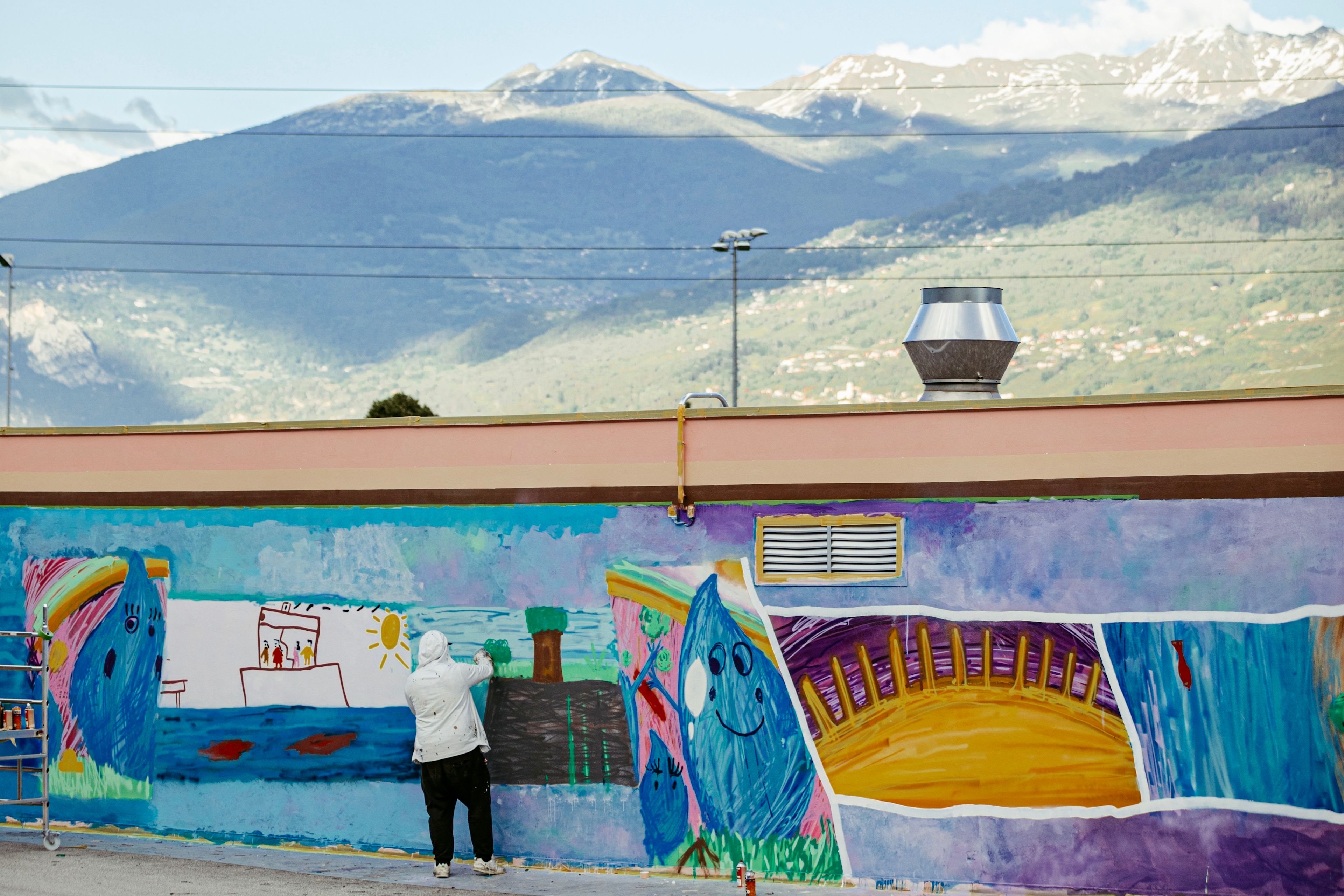 Visual projection by the French artist Julien Nonnon on the façade of the former prison within the conservation area in the heart of the village of Ernen, Valais, Switzerland