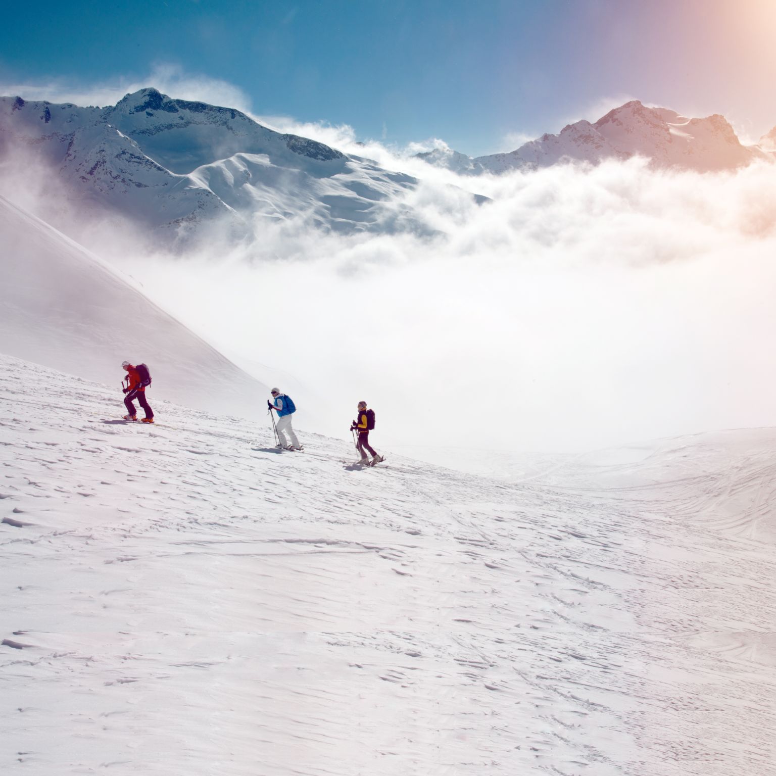 Group of ski-tourers ascending the Gandhorn at Binntal, Valais