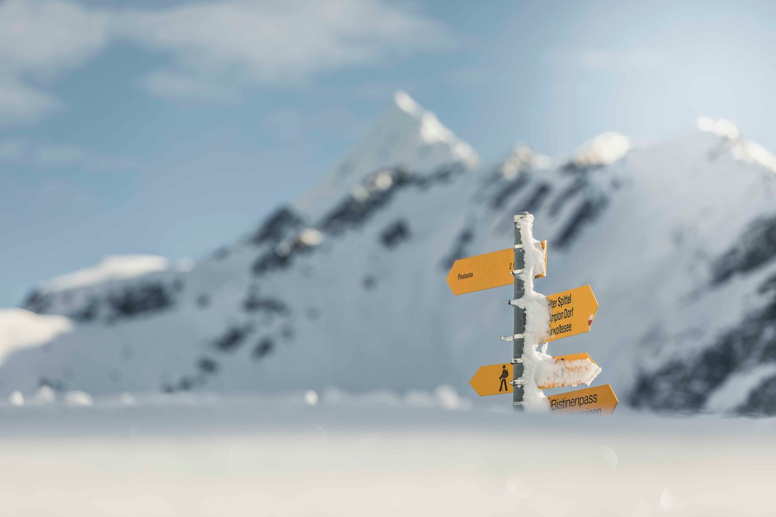 Hiking board in the snow in Goms, winter hiking, winter in Valais, Switzerland