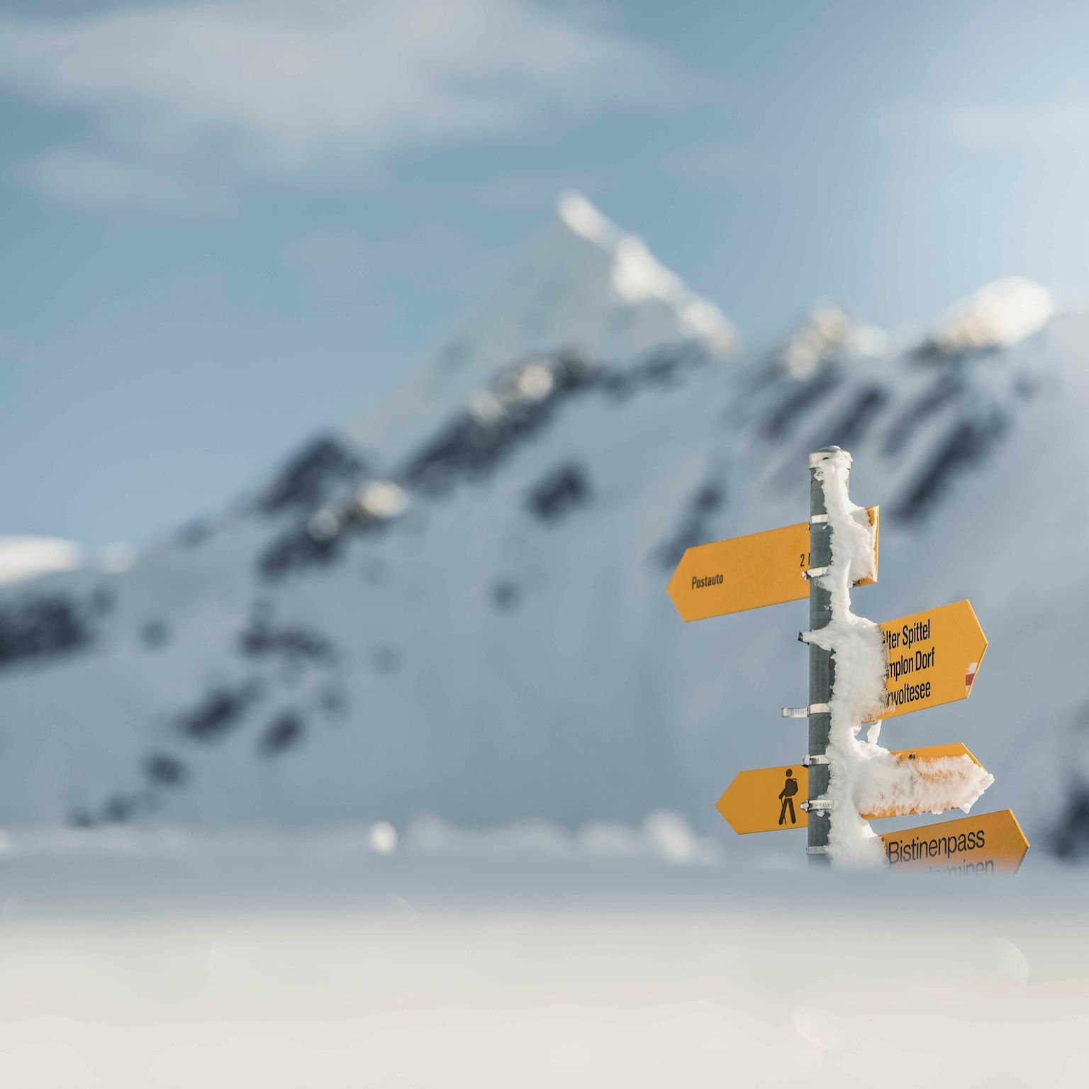 Hiking board in the snow in Goms, winter hiking, winter in Valais, Switzerland