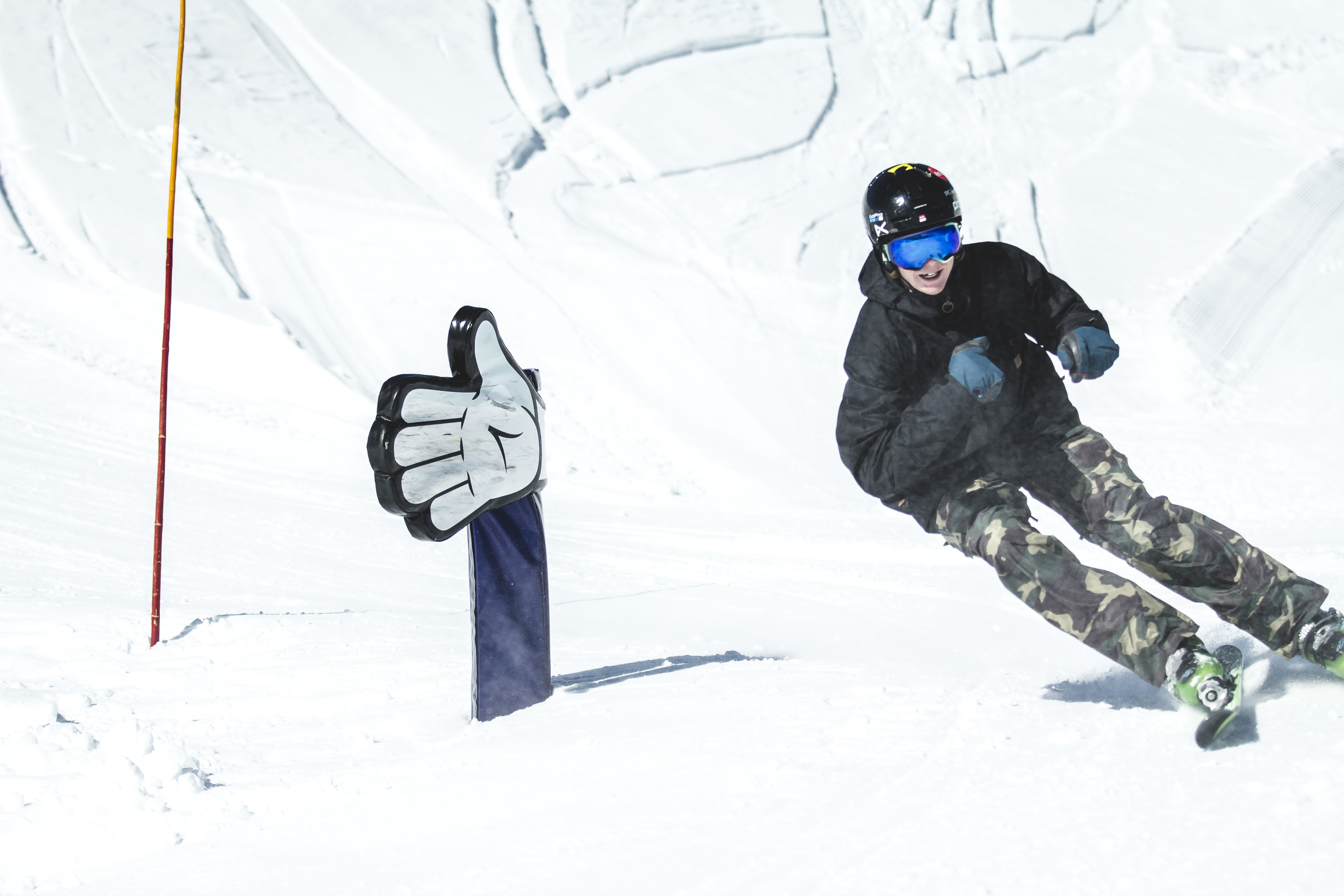 Teen rides through Funslope with “Like” hand at Snowland Kreuzboden