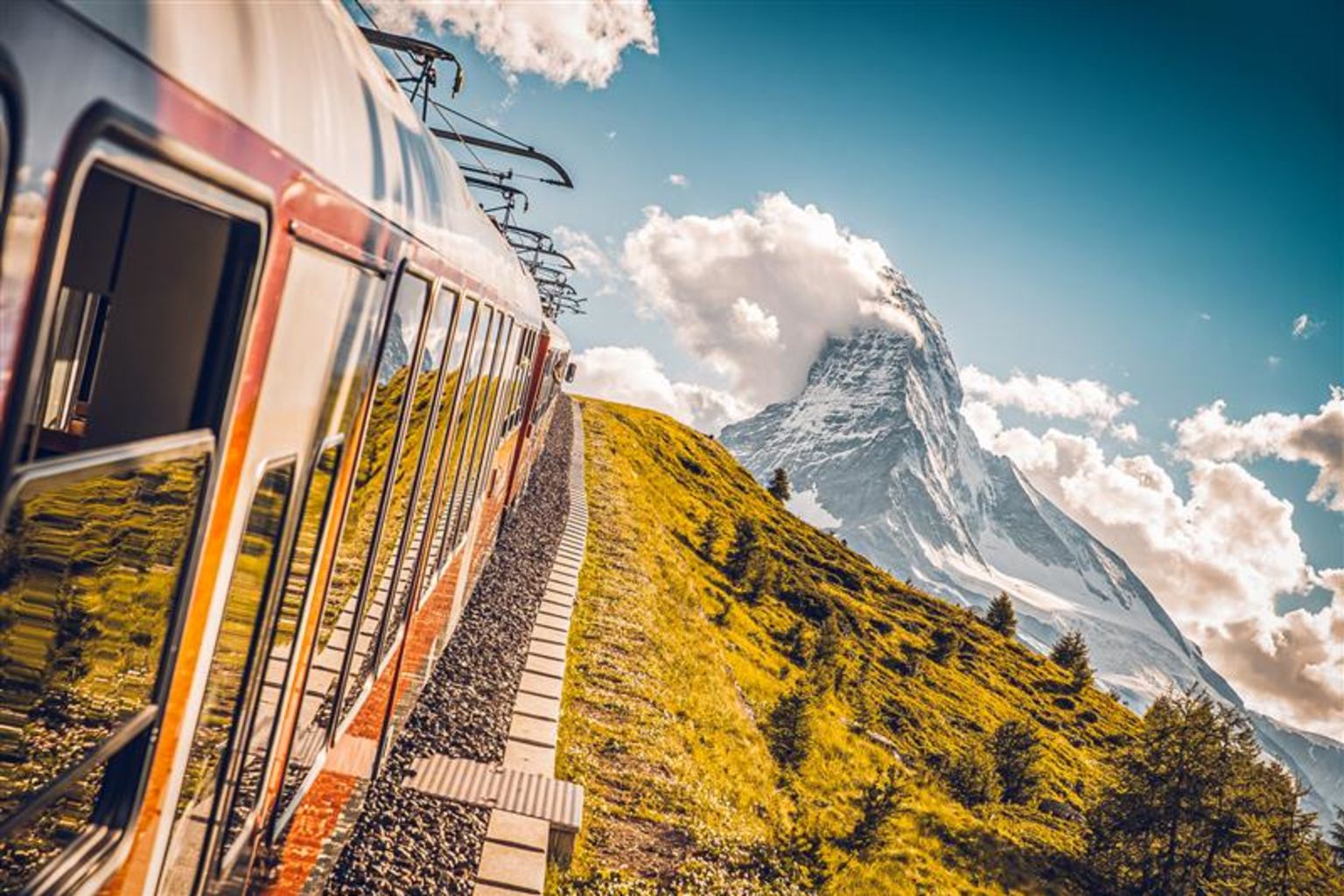 The Gornergrat-Bahn connects Zermatt to the Gornergrat by train. During the journey, the passengers have a magnificent view of the Matterhorn. Valais. Switzerland