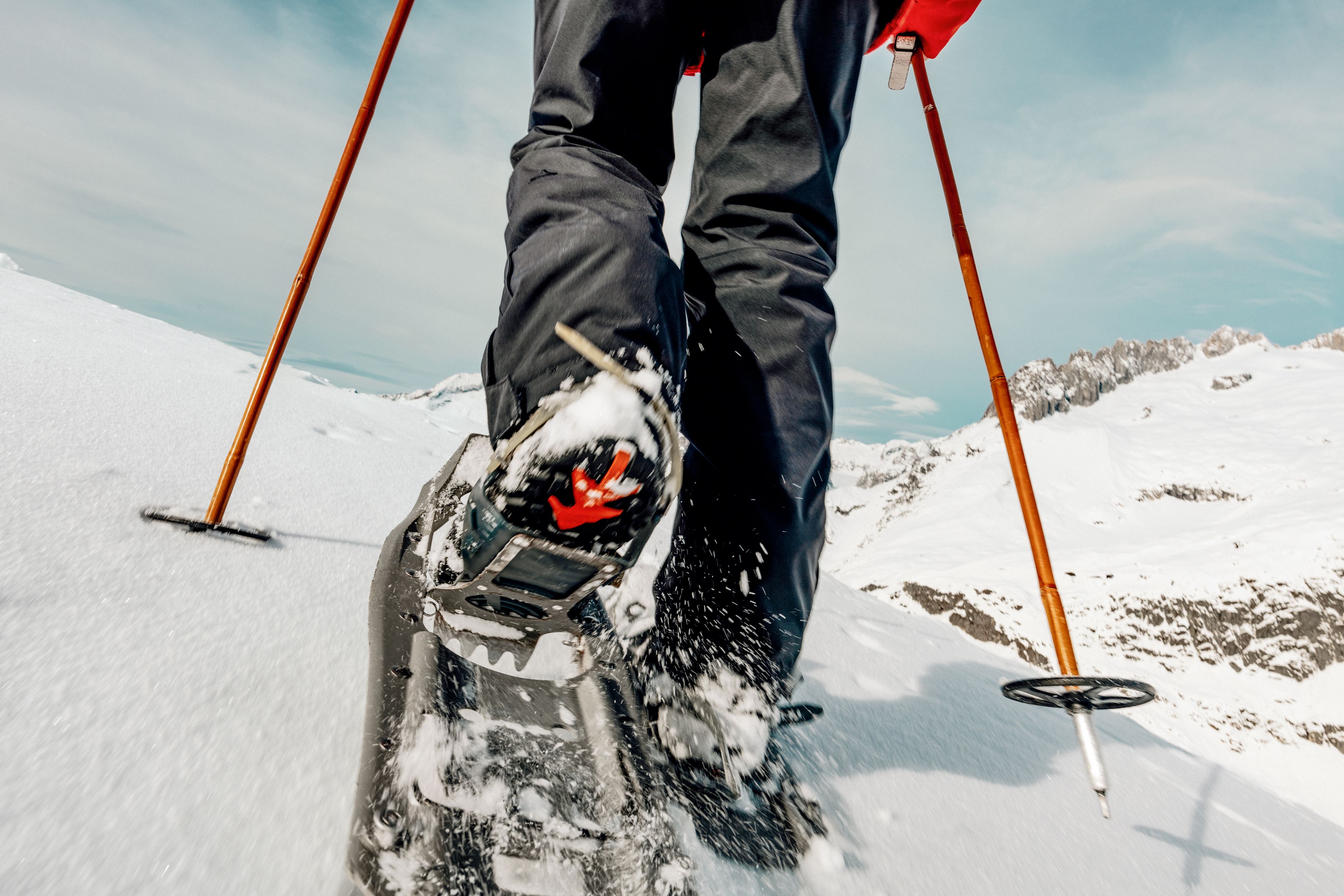 Two snowshoes and poles, that's all it takes for bliss, Valais, Switzerland