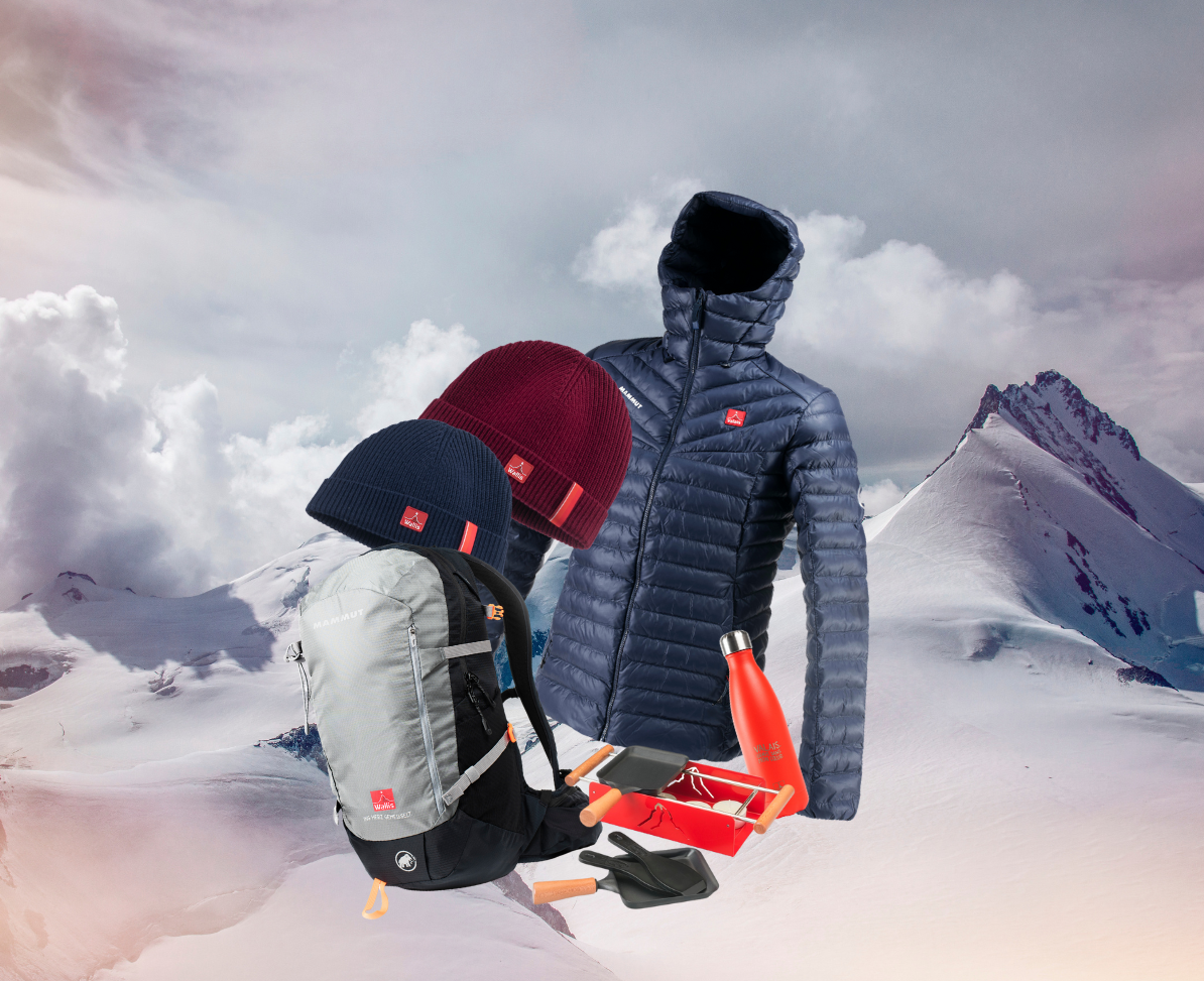 Mützen, Tasche und Daunenjacke in den Farben des Wallis. Das Ganze ist in der Valais Boutique erhältlich. Wallis, Schweiz