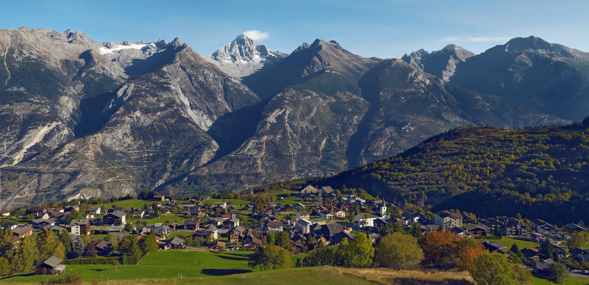 Village Unterbaech during summer, in the background the Bietschhorn, Valais