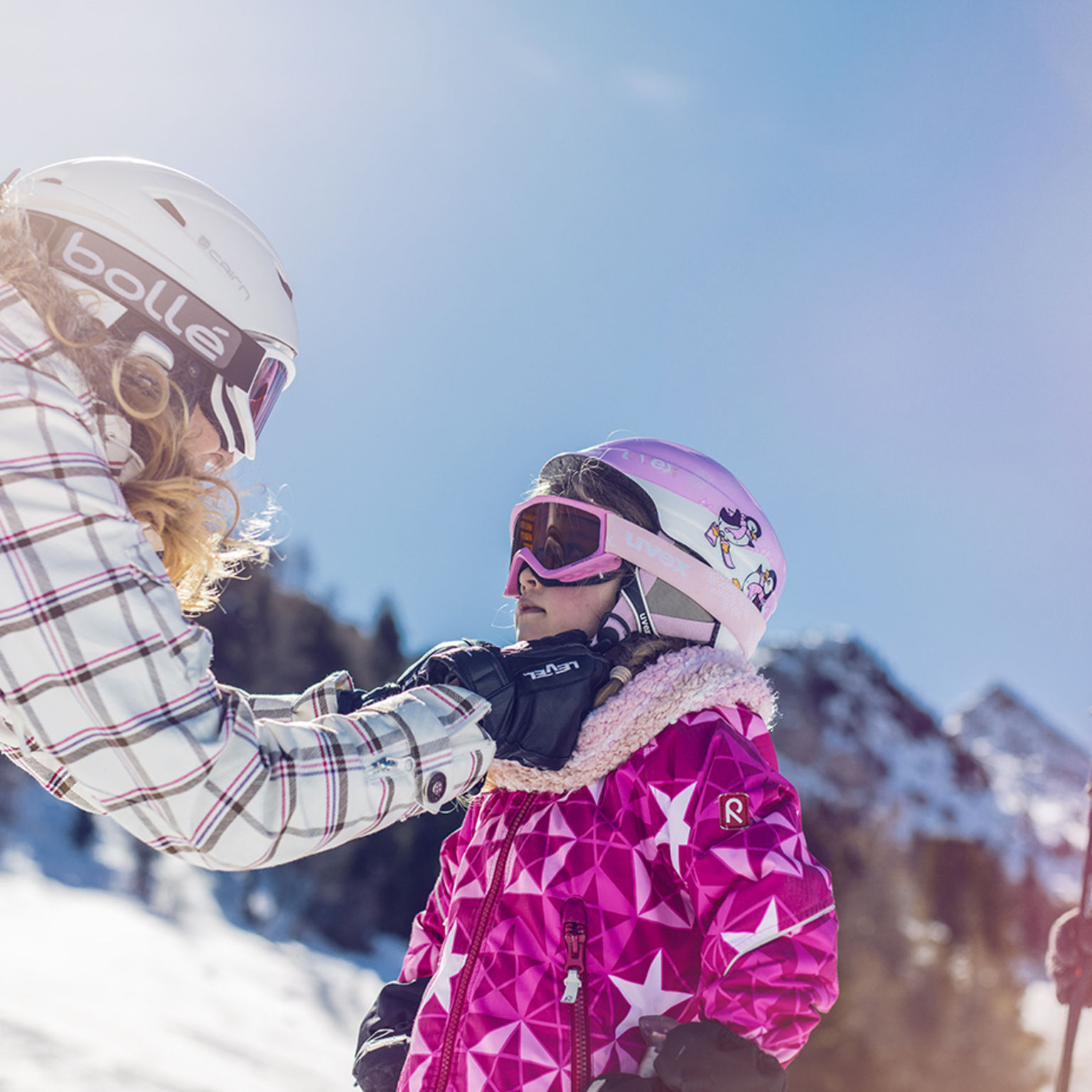Skiing with the family in Grächen, winter in Valais, Switzerland