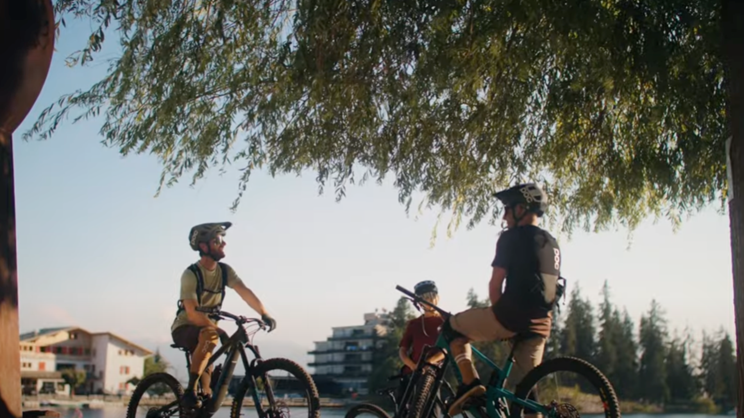 Three mountain bikers on the Valais Alpine Bike route between Crans-Montana and Leukerbad, Valais, Switzerland.