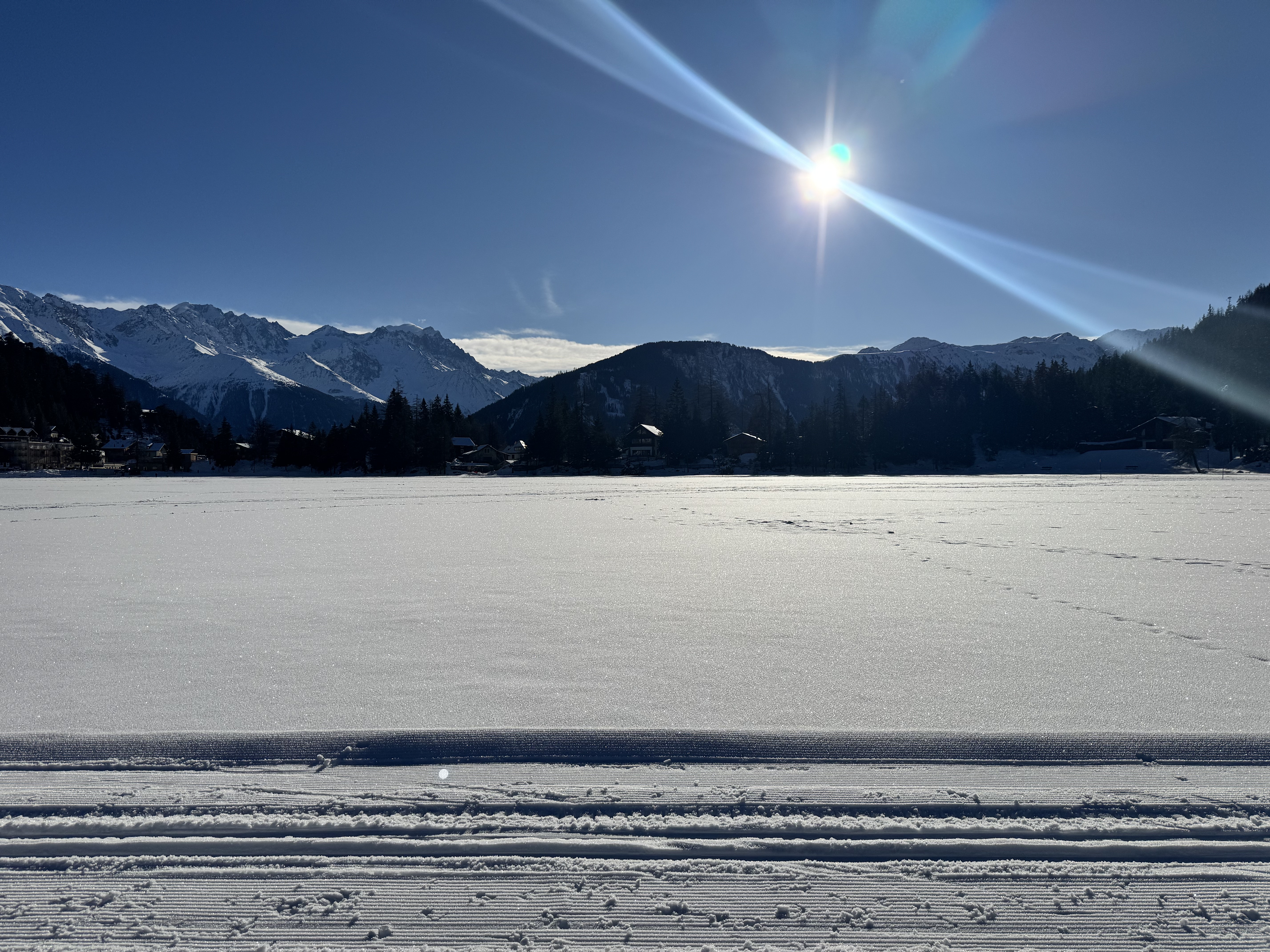 snowy and sunny lake landscape