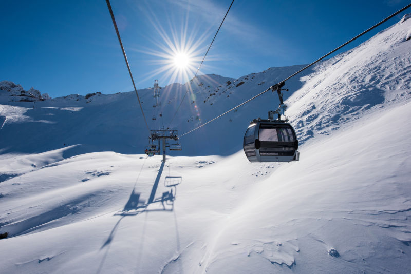 The gondola lift takes skiers to the top of the slopes in Verbier. Valais, Switzerland.