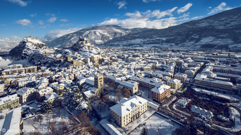 The city Sion / Sitten during winter, in the background the two castles Valère and Tourbillon, Valais