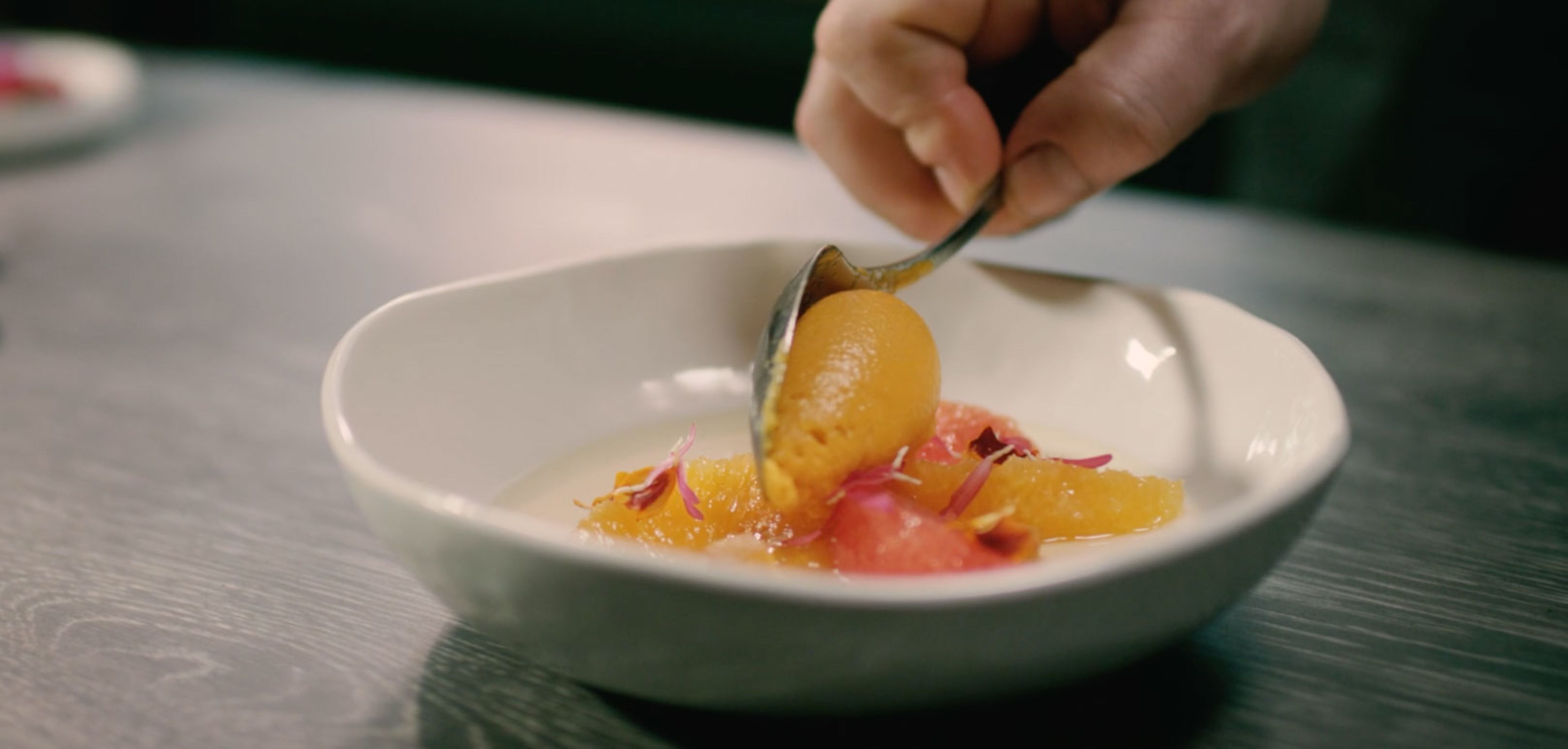 Dessert Panna cotta with citrus fruit and pumpkin ice cream, Valais, Switzerland