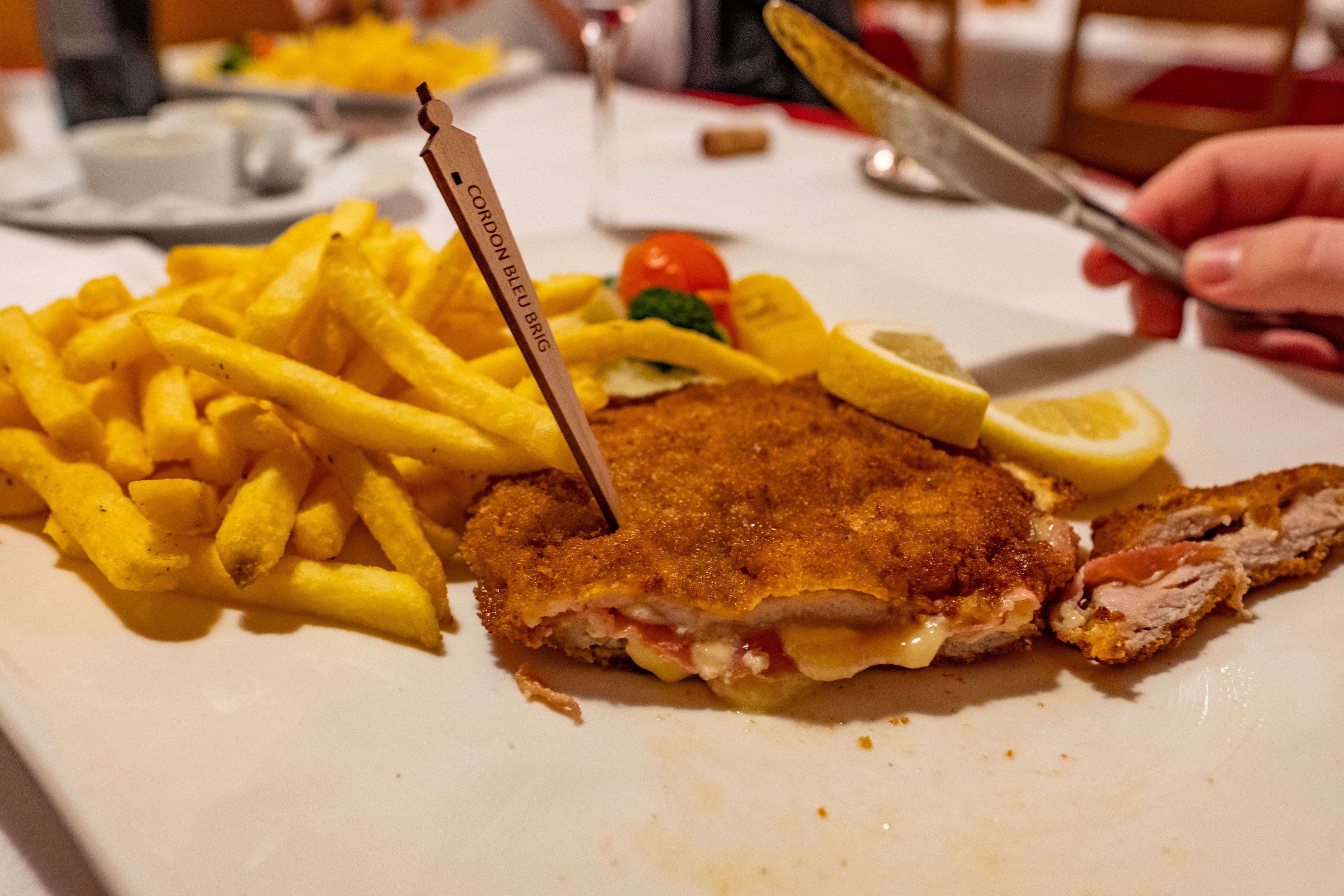According to legend, the world-famous breaded schnitzel filled with cheese and ham was invented in a Brig restaurant. Valais cuisine, Brig, Valais, Switzerland