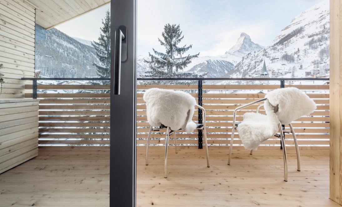 The balcony of an apartment with a view of the Matterhorn