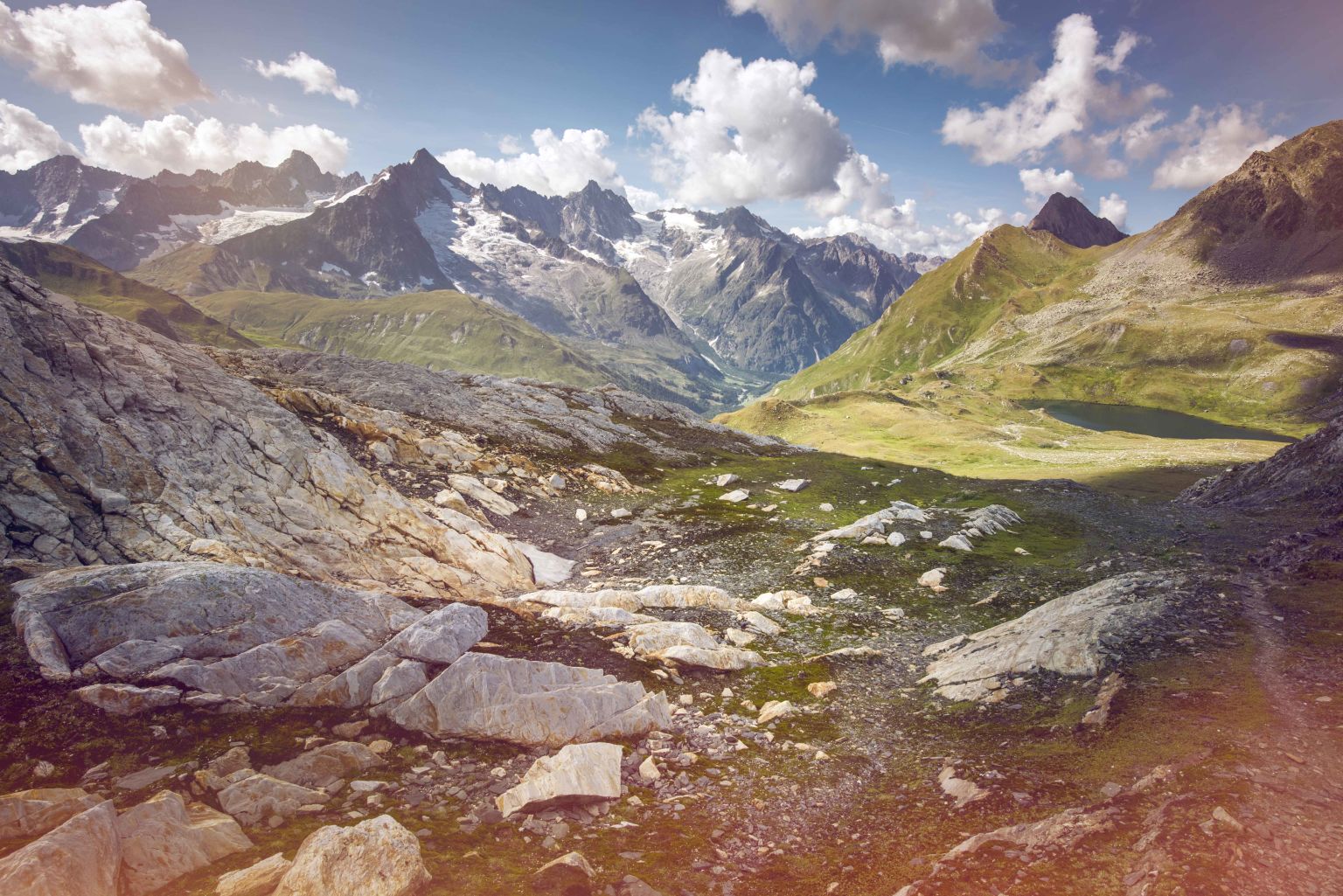Mountain landscape with stones and lake, Val Ferret, La Fouly, Valais, Switzerland