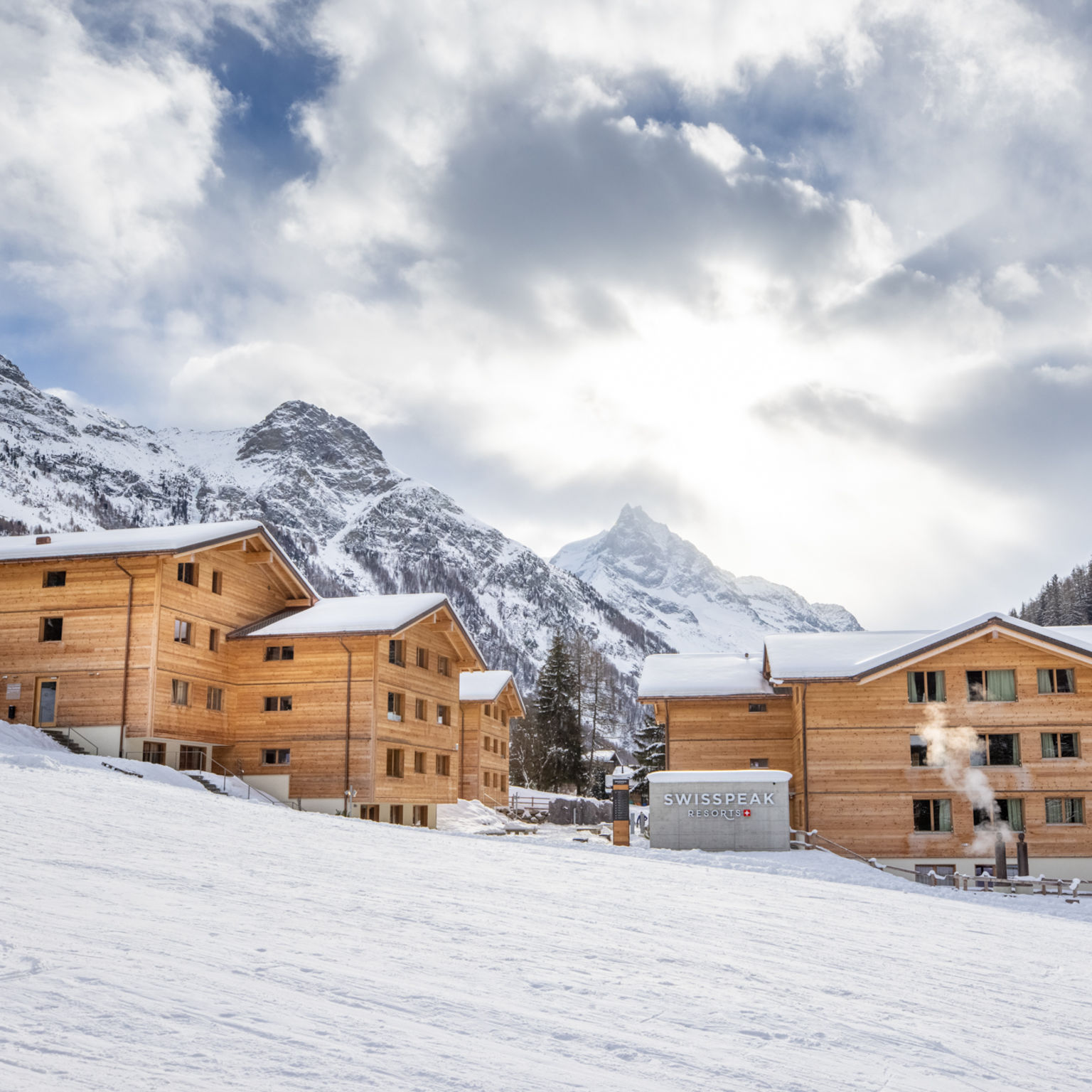 The Swisspeak Resort in Zinal in a winter setting