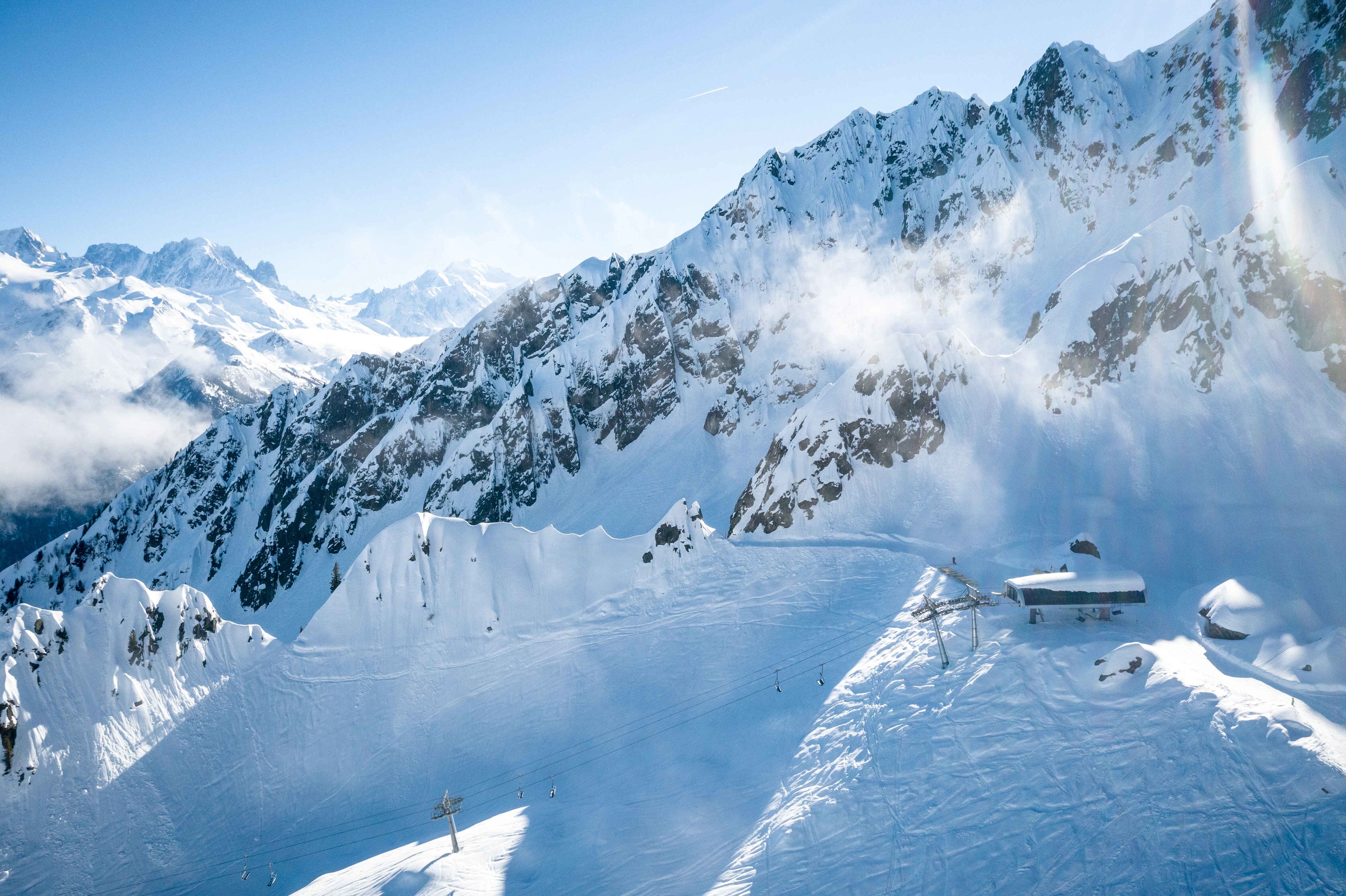 Snow-covered mountain peaks and mountain station in the ski area Les Marécottes - Vallée du Trient