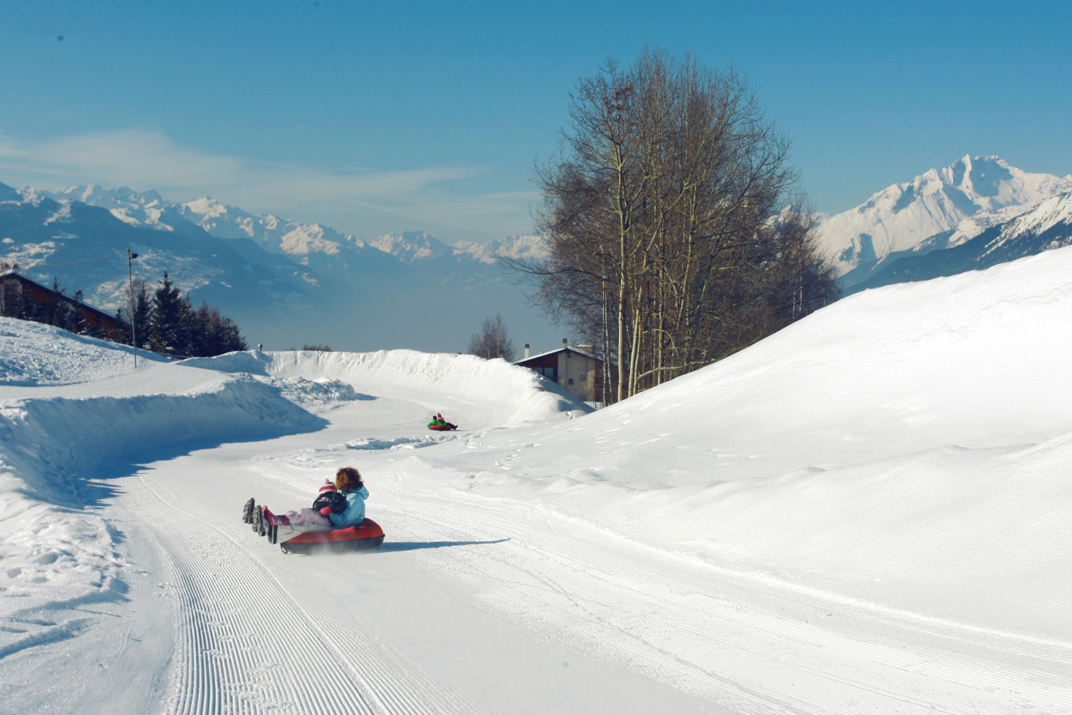 Snowtubing in Crans-Montana, Winter in Valais