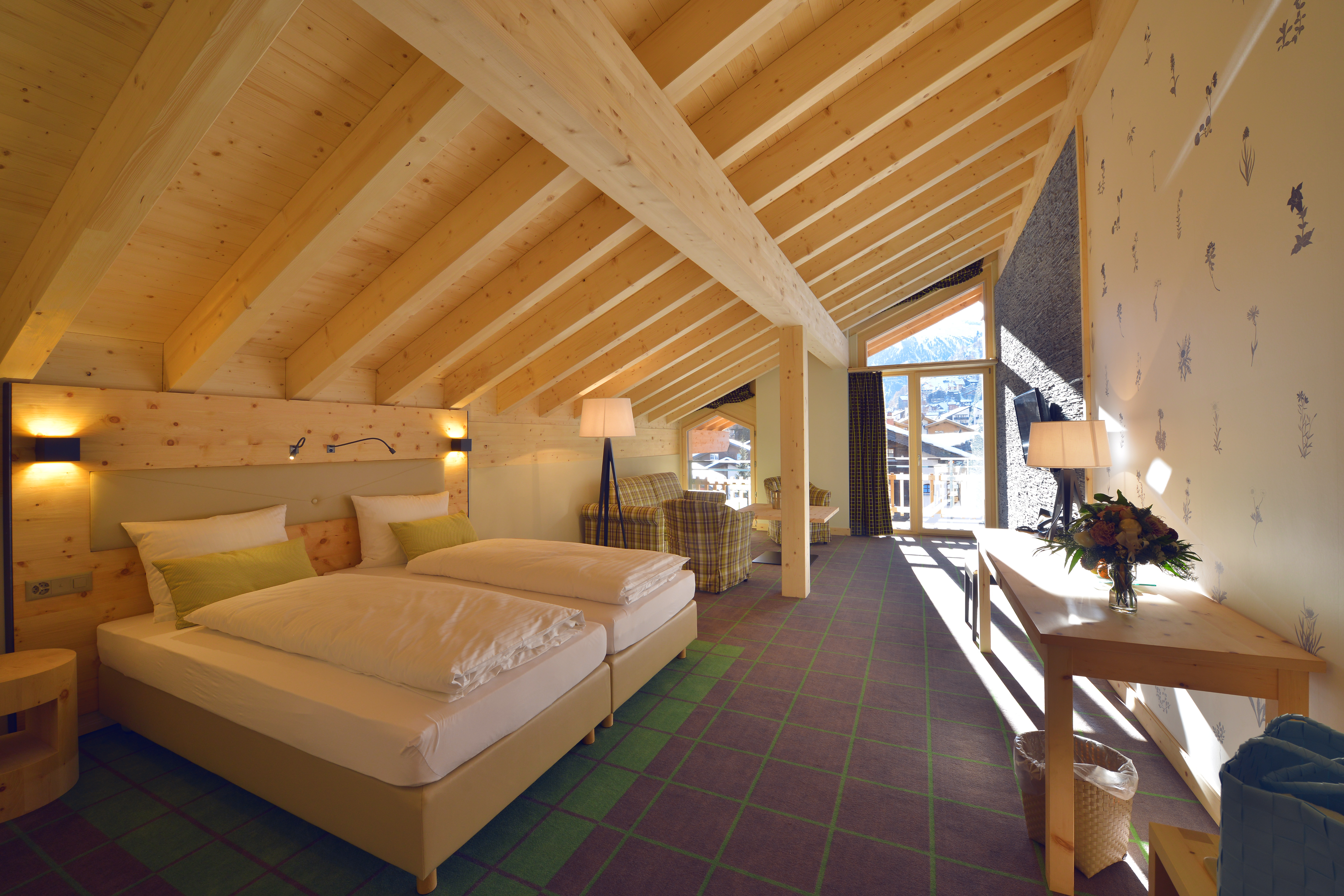 Chambre dans un hôtel au Valais, hospitalité