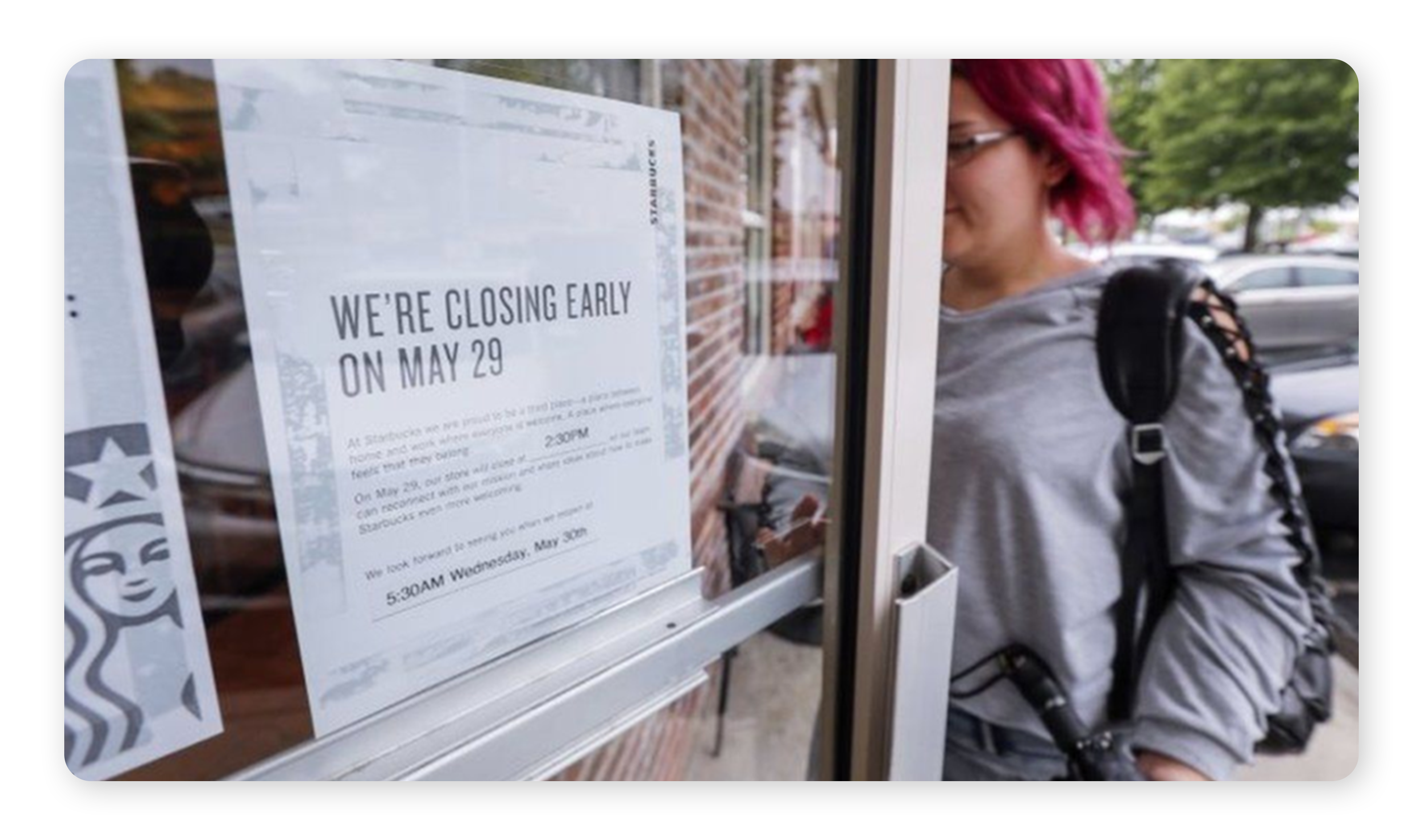A sign alerts customers of stores closing early.