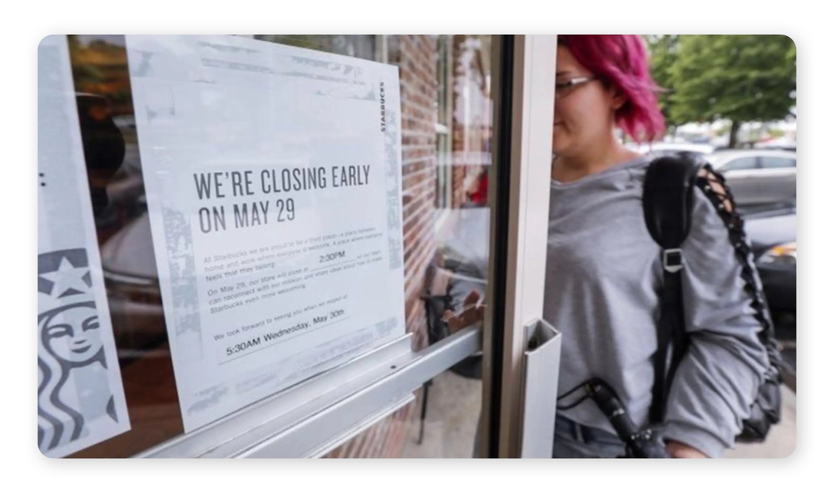 A sign alerts customers of stores closing early.