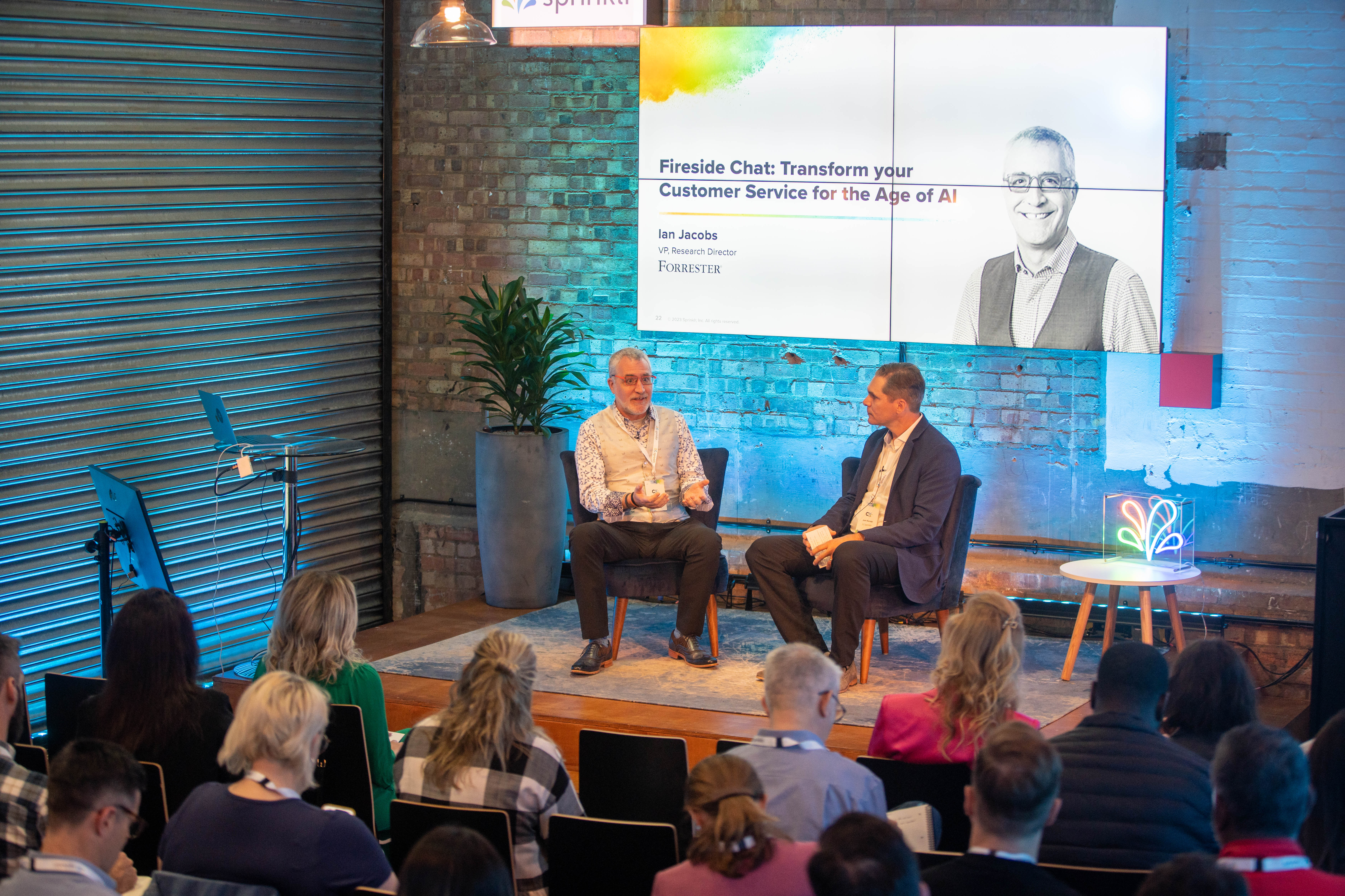 A session of Ian Jacobs during a Sprinklr CX Connect event in London, 2023