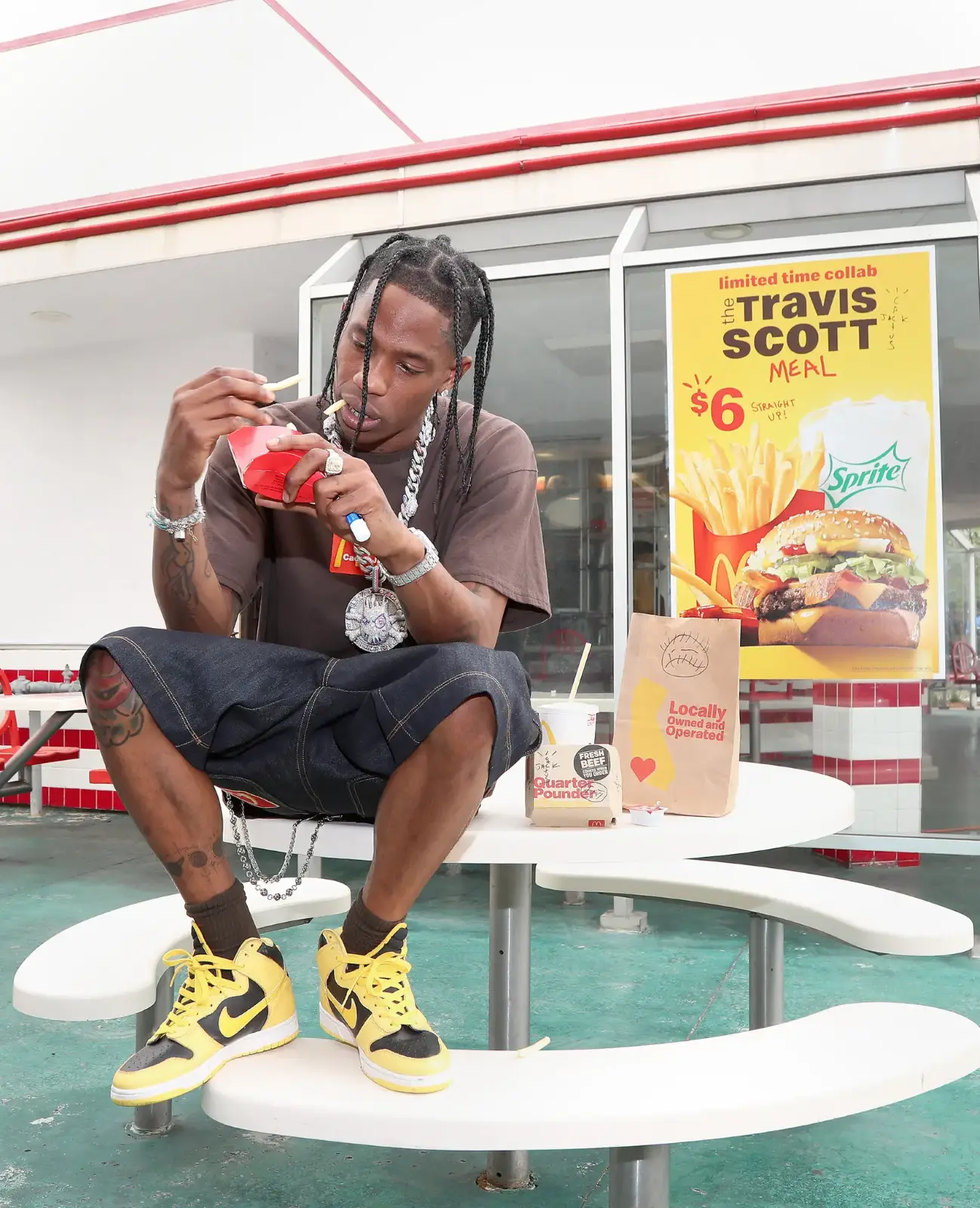 Travis Scott enjoying a McDonald-s meal that-s named after him