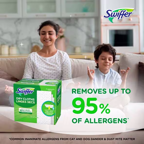 A woman and child meditate on a couch, showcasing Swiffer Dry Cloths that remove 95% of allergens