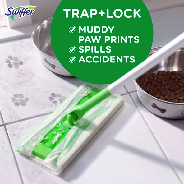 Swiffer Sweeper on tiled floor with paw prints, highlighting its trap and lock features for messes