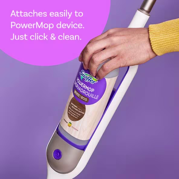 Hand attaching a Swiffer Power Mop cleaning pad; easy to use with a click for efficient cleaning