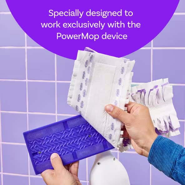 Hands holding a PowerMop cleaning pad, showing its design and compatibility with the PowerMop device
