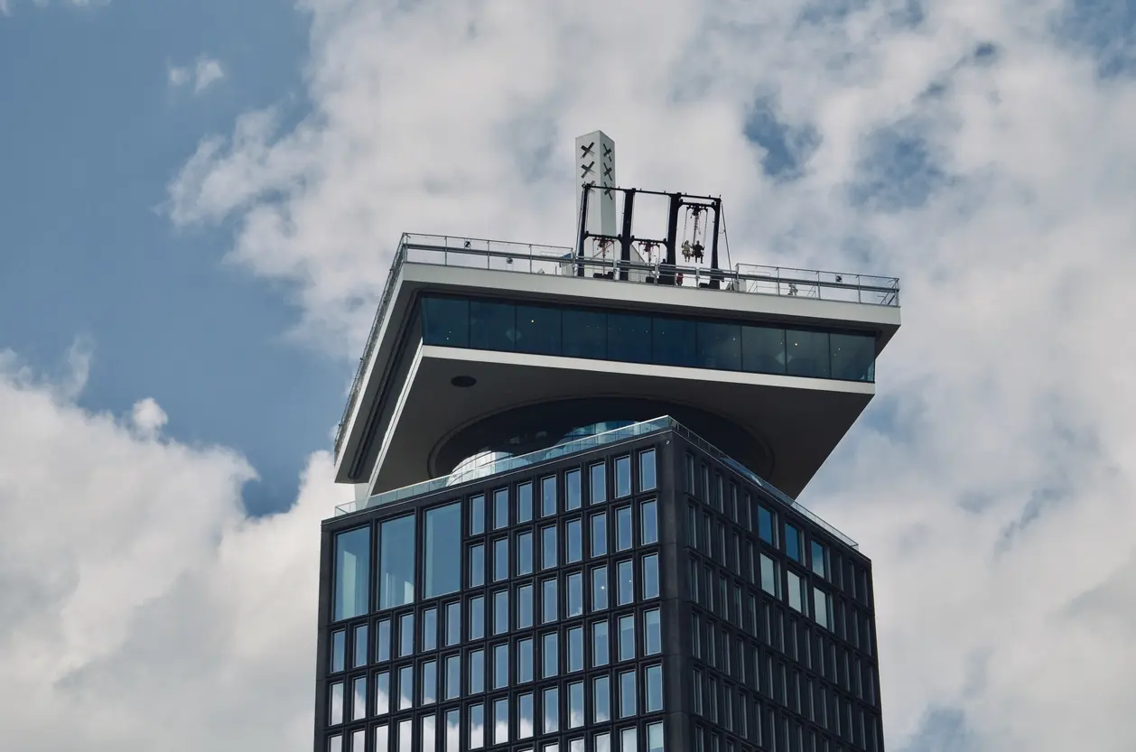 Lookout swing situated on top of tall building