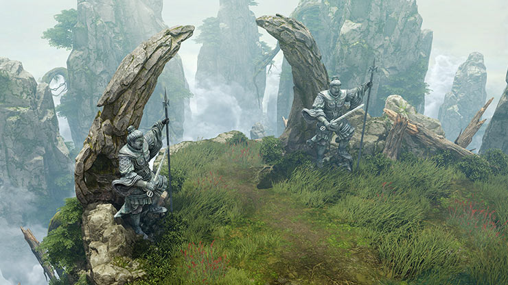 A grass covered cliffs edge with two rock formations that look like horns. Metal statues of warriors stand before the formations. Large rocks surround the cliffs edge in the background.