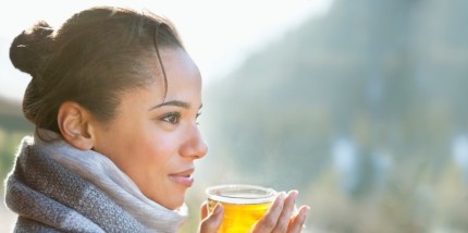 A woman with a cup of tea