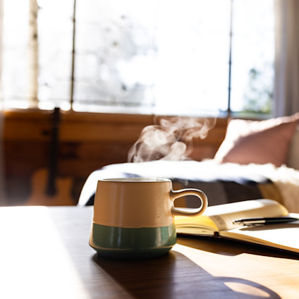 morning-coffee-and-journal-on-wooden-table-2026-01-09-09-59-45-utc