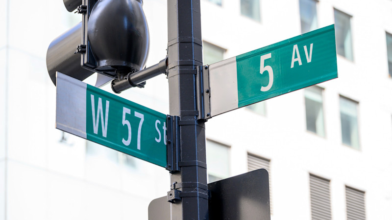 West 57th Street and 5th Ave sign
