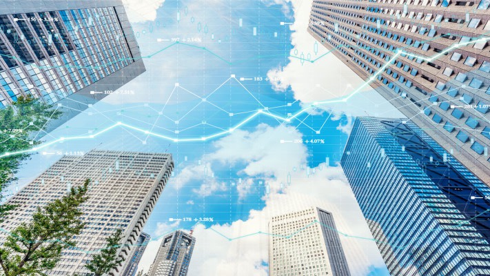 Cityscape investment theme background and stock market chart