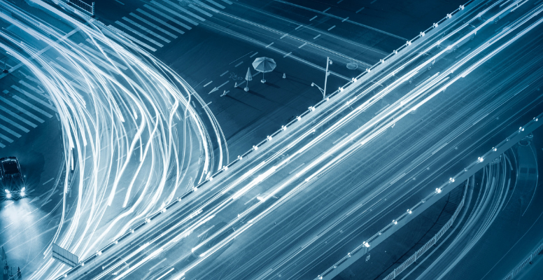 Highway Interchange Traffic Light Trails Aerial