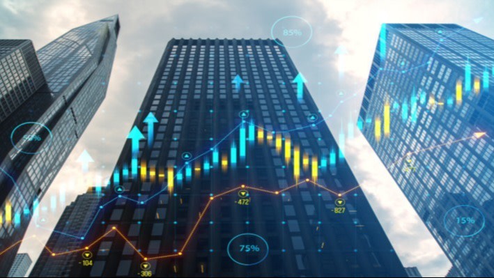 Skyscrapers with financial charts