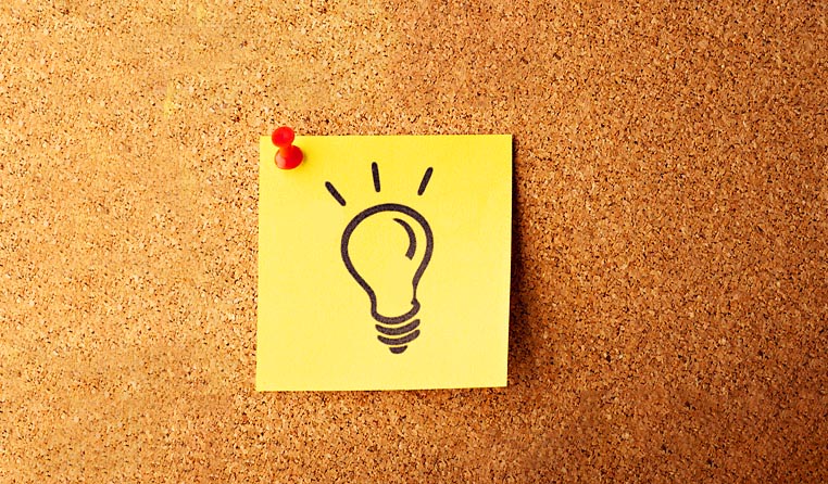 IMAGE - Article - lightbulb on sticky on cork board - Easy ways to organize your general training writing tasks - Canada