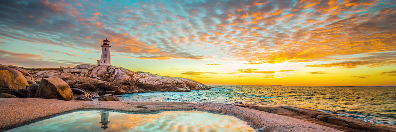 IELTS Test Centres in Nova Scotia  - Peggy's cove lighthouse sunset ocean view landscape in Halifax, Nova Scotia