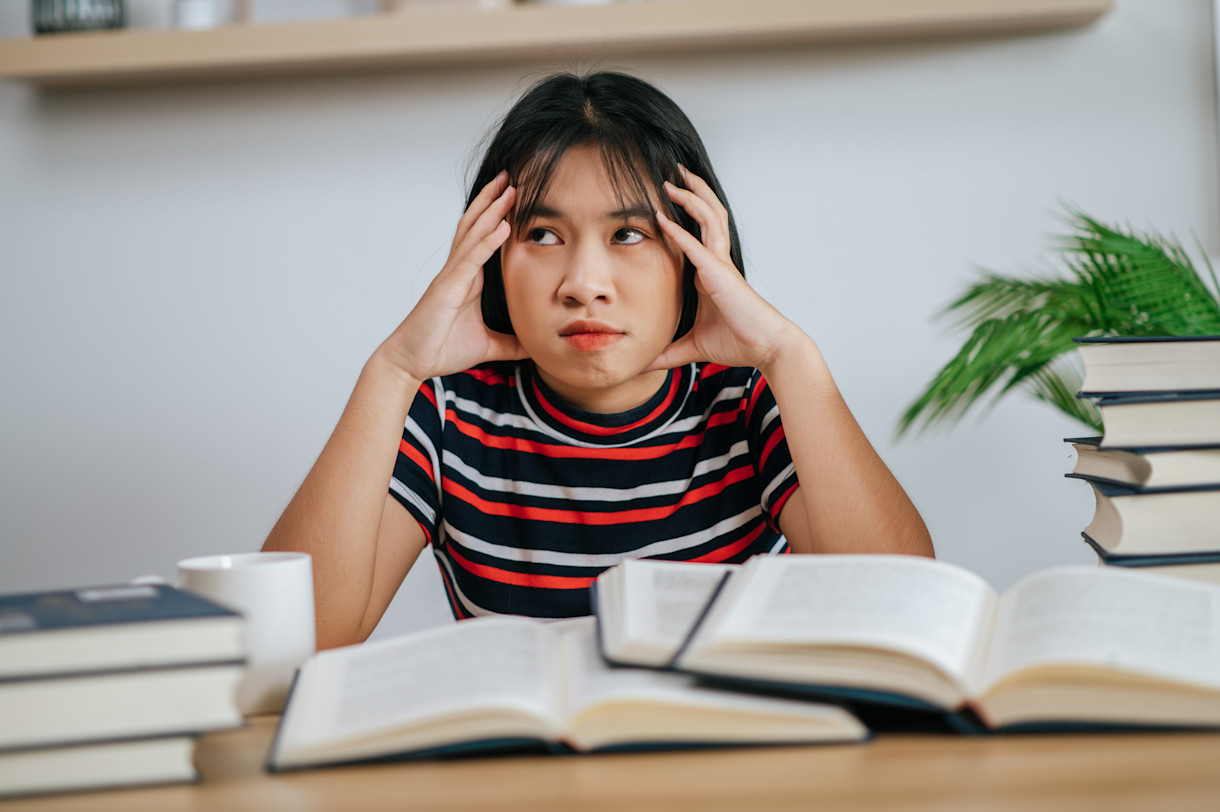 young-woman-studying-having-stress
