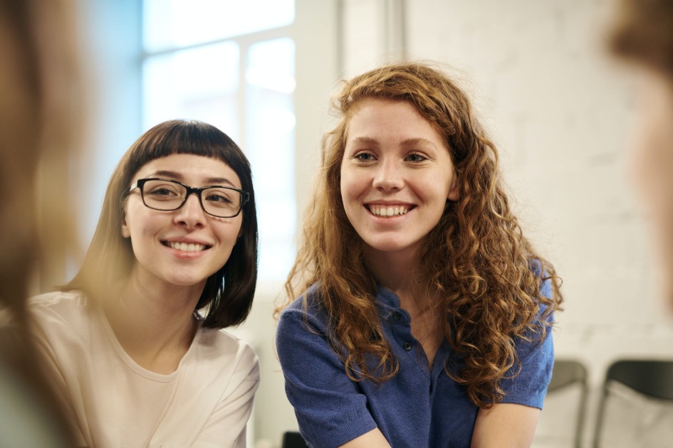 Two happy female test takers