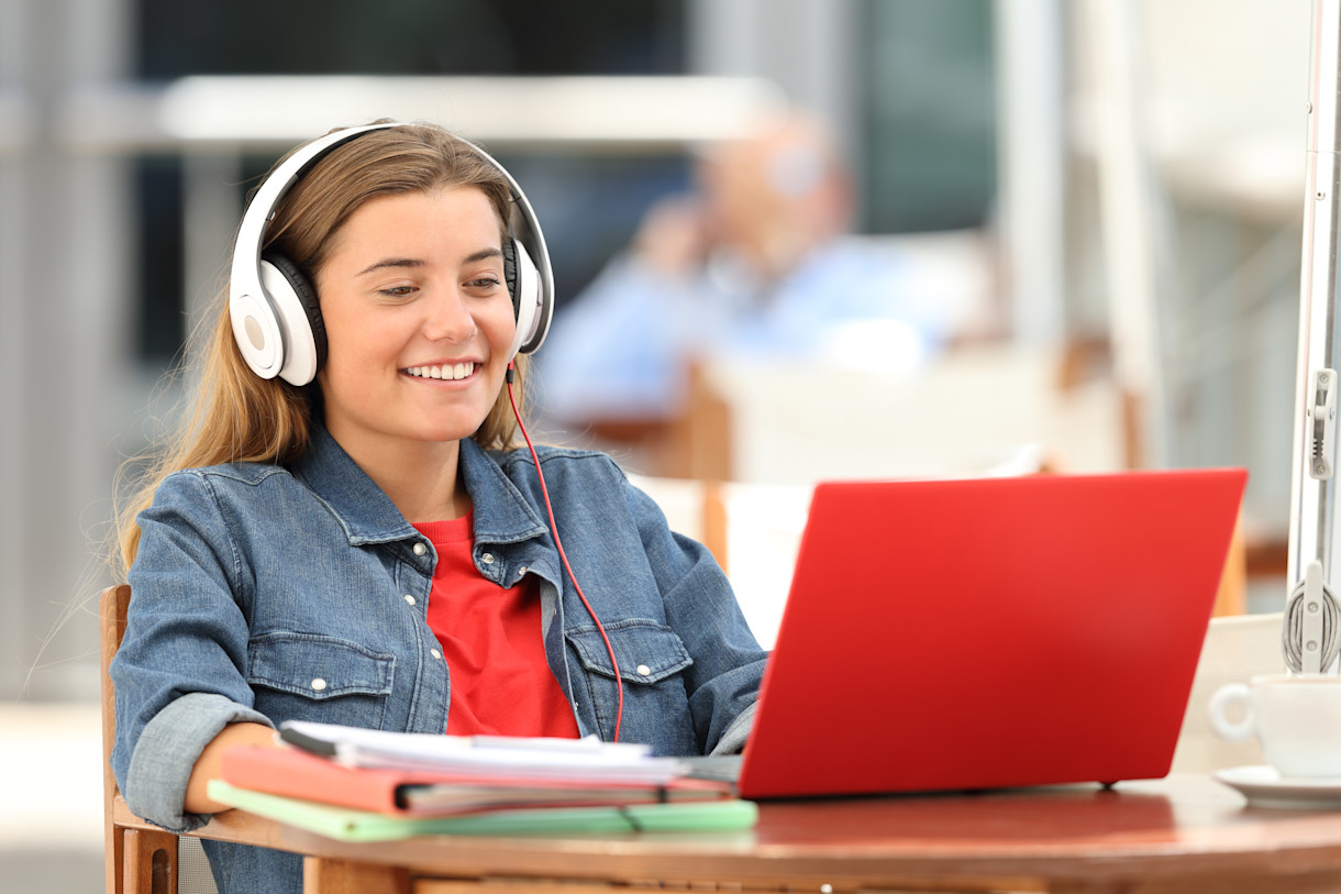 Female IELTS test taker preparing for computer-delivered test